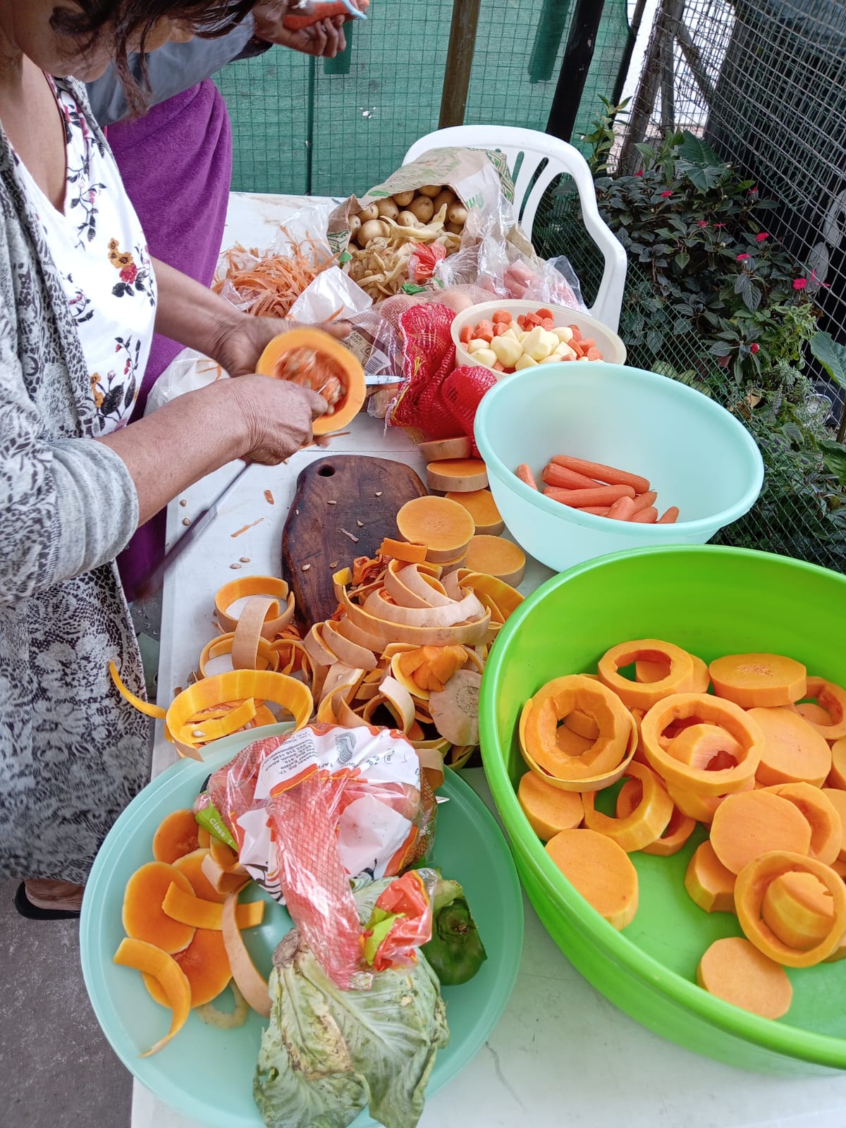 Fresh vegetables being prepared for the feeding scheme