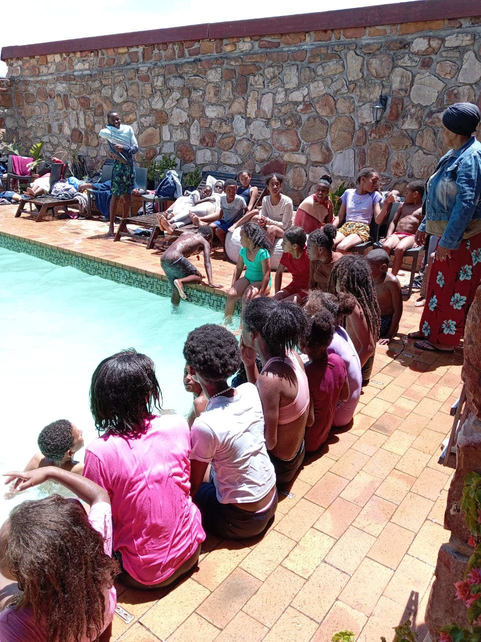 Children taking part in a pool day activity